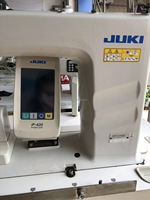 Machine à coudre industrielle informatisée de haute qualité JUKI DP-2100 à point noué pour l'encolure des manches