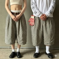 Pantalon court unisexe personnalisé en nylon et polyester avec bande latérale, coupe ample et oversize, idéal pour l'été, style jogger ou short de sport pour homme