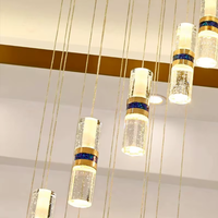 Lustre moderne en cristal doré de luxe pour hôtel, villa duplex, plafond haut, sur mesure avec longues suspensions pour escalier