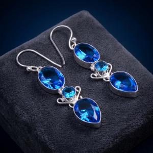 Boucles d'oreilles pendantes classiques en argent sterling 925, topaze bleue suisse ovale et en forme de goutte d'eau, bijoux de fête pour femmes, vente en gros aux États-Unis - Product Image 2