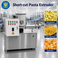Ligne de production moderne et automatique d'extrusion de pâtes pour la fabrication industrielle de pâtes courtes et de produits alimentaires.