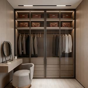 Sistema de Vestidor Personalizado con Puertas Corredizas de Vidrio, Acabado Brillante y Detalles en Dorado, Cajones Integrados e Iluminación LED - Product Image 5