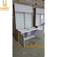 Vitrine d'exposition fonctionnelle pour lunettes en verre stratifié, design professionnel pour magasin d'optique