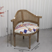 Fauteuil baril avec assise rembourrée et dossier en rotin, style bohème pour gîtes et locations de vacances, vente en gros, certifié FSC