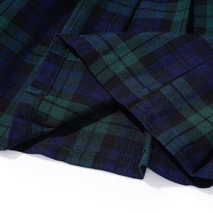 कारखाने थोक जैक डिजाइन ग्रीन प्लेड स्कूल वर्दी स्केर्ट ड्रेस बच्चों के लिए सर्दियों की जांच पॉलिएस्टर प्लेटेड स्कर्ट - Product Image 2