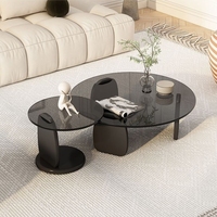 Table basse moderne et minimaliste de luxe léger pour salon, usage domestique, petits appartements, avec plateau en verre trempé et pieds en bois massif