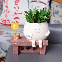 Pot de fleurs en résine en forme de pieuvre souriante mignonne avec voilier et gouvernail, motif de personnage de dessin animé, disponible en OEM et ODM