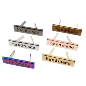 Prezzo di fabbrica personalizzato in metallo goffrato Logo marca Design etichetta piastra forma rettangolare tag Hardware borsa Logo in metallo goffrato
