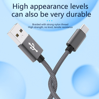 Câble de données USB-A vers Type-C 10W avec un design unique en nylon tressé durable, adapté aux appareils Android et iPhone