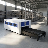 Machine de découpe laser à fibre 6 kW haute puissance, très demandée, avec cabine de protection et plateforme d'échange pour tubes et profilés