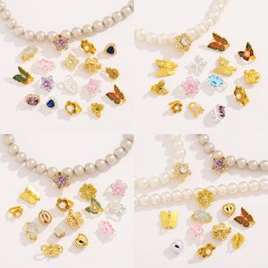 อุปกรณ์ตกแต่งเครื่องประดับหนานทง ทอง 18k ชุบทองแดง DIY ตัวล็อคแบบผีเสื้อ รูปทรงดอกไม้ประดับมุก ขนาดกลาง - Product Image 3