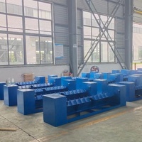 Plateforme élévatrice compacte en acier pour quai de chargement, idéale pour le chargement de palettes en usine.