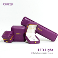 Boîte à bijoux FORTE en cuir PU violet avec éclairage LED, pour bagues et colliers, personnalisable avec logo