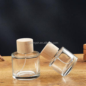 Venta caliente 30ml 50ml 100mL Perfume redondo Engarzado <span class=keywords><strong>en</strong></span> botella de vidrio con bomba tapa de madera para Perfume loción Perfume botella de vidrio - Product Image 3