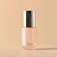 Flacon pompe en verre de 30 ml avec diffuseur à bâtonnets pour crème visage, fond épais, forme ronde, sérigraphié, cosmétique