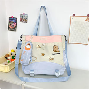 Venta caliente moda lindo patrón chica impermeable cremallera frontal bolsillo mensajero mujeres bolso de compras con colgante de felpa - Product Image 4