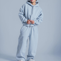 Ensemble jogging homme personnalisé 2 pièces : sweat à capuche zippé oversize et pantalon de survêtement large bleu clair uni, style streetwear décontracté