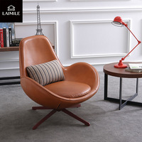 Fauteuil pivotant de style nordique à dossier haut en cuir, fauteuil individuel avec coussin pour la maison, la chambre ou la salle de réception