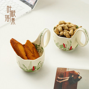 Cesta de cerámica para frutas con diseño de lirio del valle verde, plato para postres y aperitivos con asa para uso doméstico. - Product Image 1
