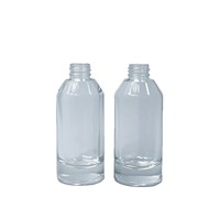 Crème pour le visage verte 50 ml et huile essentielle en flacon en verre avec pulvérisateur à pompe, diffuseur de parfum rond transparent