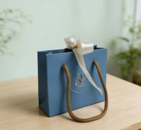 Sac cadeau en coton recyclable de luxe avec nœud en ruban, estampage à chaud doré, logo personnalisé pour colliers, bijoux et bracelets – Vente en gros