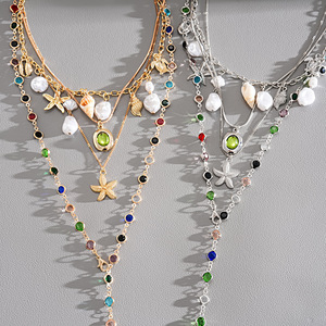 Collana Multistrato Boho a Tema Oceano con Ciondoli a <span class=keywords><strong>Stella</strong></span> Marina, Conchiglia e Perle, Collana con Catena <span class=keywords><strong>di</strong></span> Perline <span class=keywords><strong>di</strong></span> Cristallo Colorate per Donna - Product Image 4