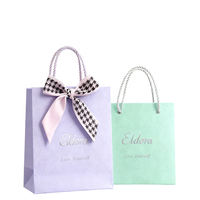 Sacs en papier cartonné cosmétique personnalisés recyclables avec logo imprimé Emballage Sacs cadeaux en papier texturé de luxe avec poignée