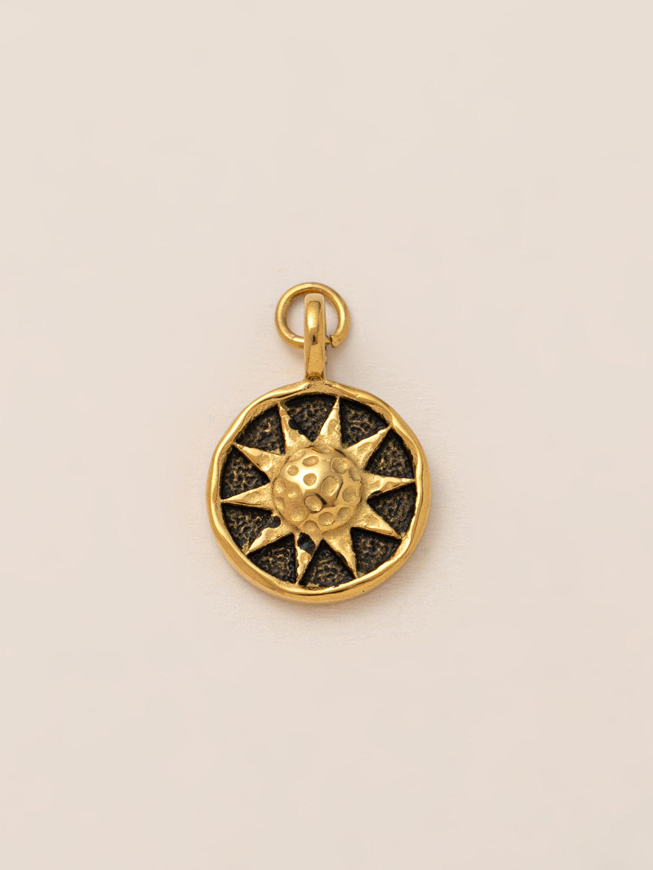 Pendentif soleil en bronze