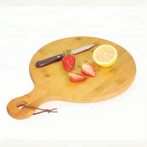 Planche à découper en bambou ronde avec poignée pour couper les fruits et les légumes, usage en cuisine - Product Image 1