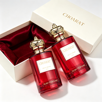 Großhandel Beliebtes Design Elegante Rubinrote Runde Parfümflasche 100ml Luxuriöse Glas-Duftflasche für Damen