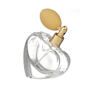 Botellas de perfume de cristal en forma de corazón transparentes al por mayor de los nuevos diseños 75ml con la bomba de aire - Product Image 3