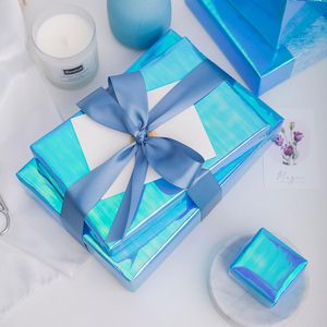 Yarcony Metallic Iridescent <b>Wrapping</b> <b>Paper</b> 17Inch X 33Feet Blue Holographic Gift Wrap Packaging <b>Paper</b> - Product Image 3