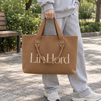 Sac à bandoulière tricoté personnalisé avec logo, poignées courtes, pour les acheteurs de boutiques soucieux de la mise en place de gammes d'accessoires féminins