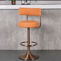 Tabouret de bar en fer pour la maison, style nordique de luxe, avec assise ronde rembourrée en cuir PU orange et dossier bas, base en métal bronze