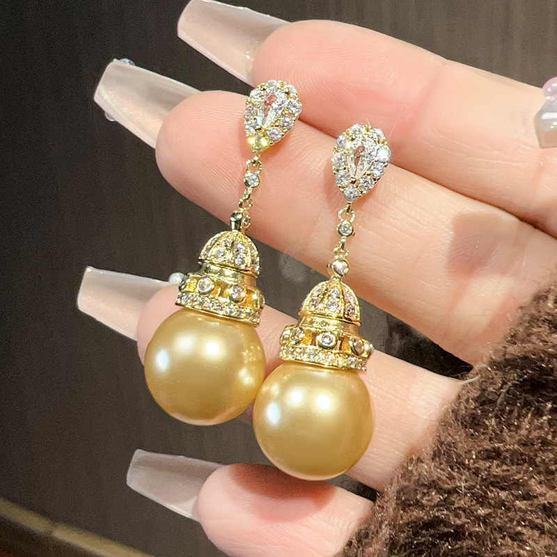Boucles d'oreilles boules dorées