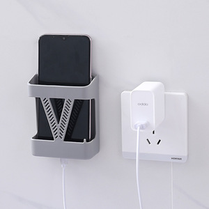Soporte de pared para cargar el teléfono, plástico gris, adhesivo, sin perforaciones, para mesita de noche - Product Image 1