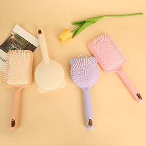 หวีนวดสีลูกกวาด พลาสติกขนาดใหญ่ ใช้งานได้กับผิวหนัง เหมาะสำหรับใช้ในบ้าน - Product Image 2