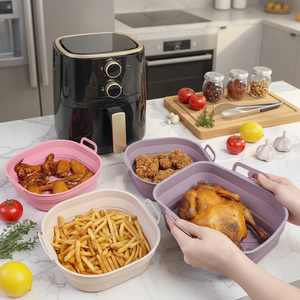 Nouveau moule <span class=keywords><strong>de</strong></span> <span class=keywords><strong>cuisson</strong></span> pliable en silicone pour friteuse à air, réutilisable, pour <span class=keywords><strong>four</strong></span> à micro-ondes, idéal pour gâteaux et pizzas, emballé en boîte - Product Image 1