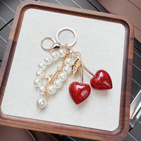 Schattig parelbandje hars hartvormig kersen sleutelhanger voor tas charme designer mode fruit hanger autosleutel hanger accessoires
