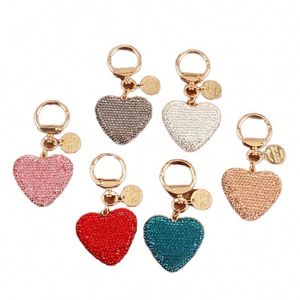 Llavero de aleación metálica con forma de corazón brillante para llaves de coche, bolso, bonito y elegante, con borla, regalo para el Día de San Valentín - Product Image 1