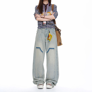 Pantalon droit délavé effet vieilli avec patchs de la marque American Trendy, versions homme et femme en denim bleu clair - Product Image 3