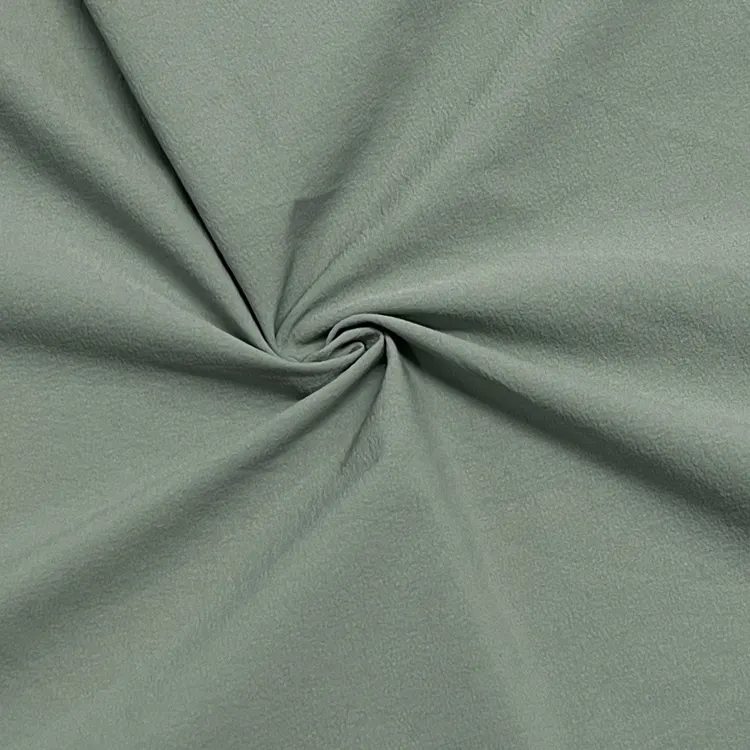 Anyaman 4 cara peregangan nyaman 88% nilon 12% kain spandeks ringan untuk celana