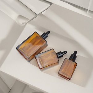 ขวดแก้วทรงสี่เหลี่ยมผืนผ้าขนาด 30 มล. 50 มล. 100 มล. สำหรับน้ำมันหอมระเหยและยาหยอดตา ขายส่ง พร้อมหลอดหยดสีอำพันแบบกำหนดเอง ขวดน้ำมันใส่ผมขนาด 1 ออนซ์ - Product Image 2