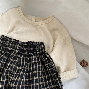 Vente en gros de pantalons en coton et <span class=keywords><strong>lin</strong></span> à 9 points pour garçons et filles d'automne 2022 personnalisés pantalons lanterne à double carreaux pour enfants - Product Image 3