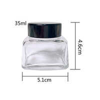 Bouteille d'encre en verre de triangle du prix usine 50ML pour le style de recharge de stylo plume avec le bouchon à vis