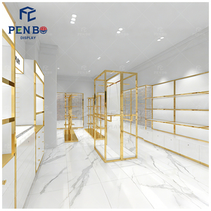 رف ملابس ذهبي ورفوف للبوتيك من مصنع قوانغدونغ، تصميم وديكور راقي لمتجر الأزياء ومتجر الملابس الراقية - Product Image 4