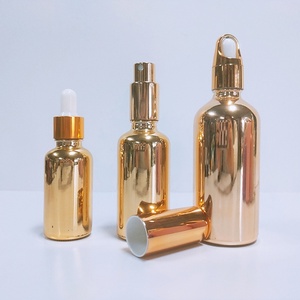 1 oz <b>Dropper</b> Glass Cosmetic Pipette <b>Bottle</b> 30ml Round Matte clear Amber Serum <b>Bottles</b> with Rose Gold Screw Lid - Product Image 4