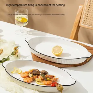 Plat de cuisson moderne <span class=keywords><strong>en</strong></span> céramique blanche avec doubles poignées et bord noir, plat ovale <span class=keywords><strong>en</strong></span> <span class=keywords><strong>porcelaine</strong></span> pour poisson, pâtes, salade, hôtel, restaurant - Product Image 5