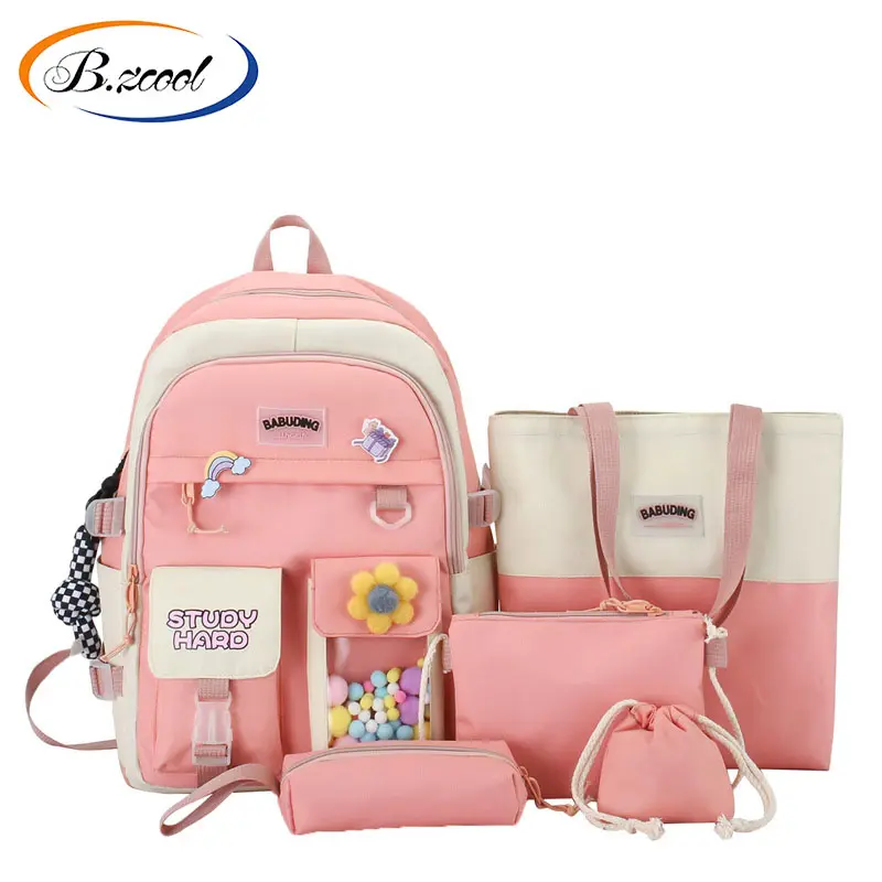 Mochila de lona al por mayor para mujer, bolsos de mano de gran capacidad para mujer, mochila para niños, mochilas escolares con colgante CY74288