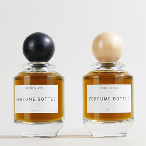 नई डिजाइन लक्जरी राउंड आकार 100 एमएल ग्लास इत्र की बोतल लकड़ी की गेंद कैप के साथ - Product Image 1